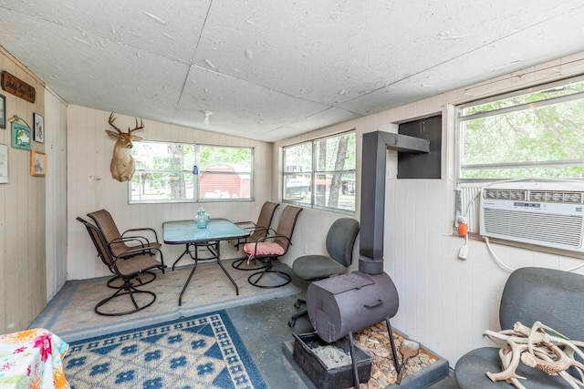 sunroom / solarium featuring plenty of natural light and cooling unit