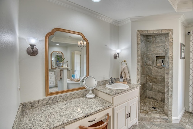 bathroom with crown molding, tiled shower, and vanity