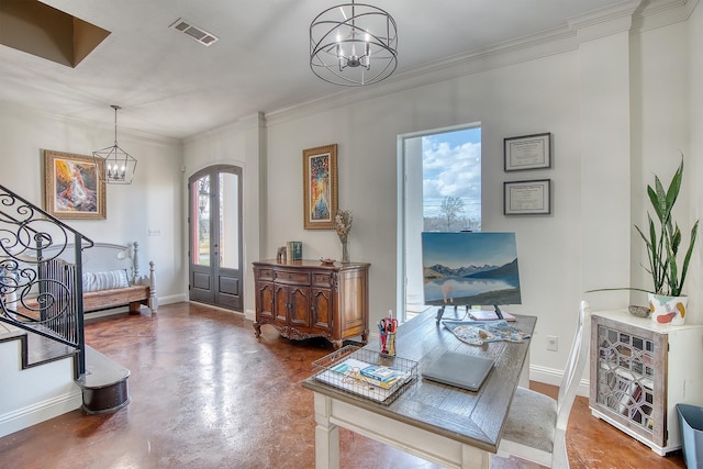 interior space featuring a healthy amount of sunlight, a notable chandelier, and concrete floors