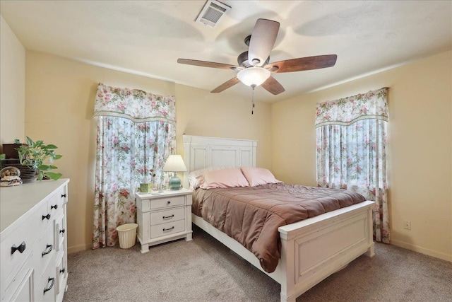 595 Blanton Pl, Beaumont, TX 77707 - bedroom featuring light carpet, ceiling fan, and baseboards