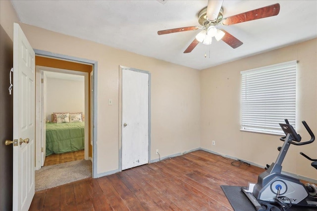595 Blanton Pl, Beaumont, TX 77707 - exercise room with hardwood / wood-style floors, a ceiling fan, and baseboards