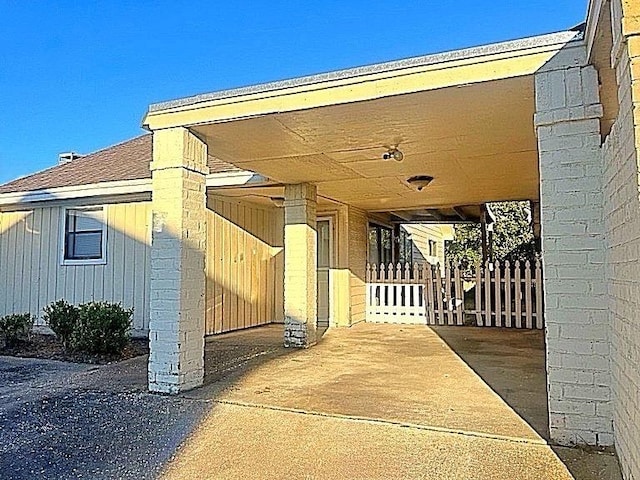 exterior space with a shingled roof