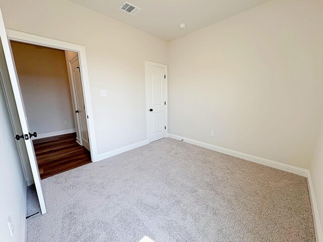 1240 Little Cypress Loop, Orange, TX 77632 - unfurnished bedroom with carpet flooring and baseboards
