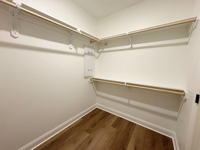 1240 Little Cypress Loop, Orange, TX 77632 - walk in closet featuring dark wood-style flooring