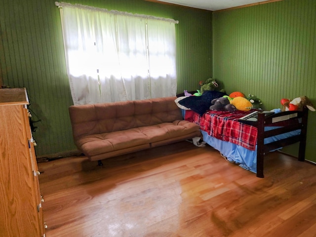 bedroom with wood-type flooring