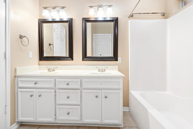 bathroom with vanity, tile patterned floors, and shower / bathing tub combination