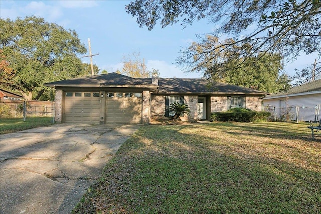 single story home with a front yard and a garage