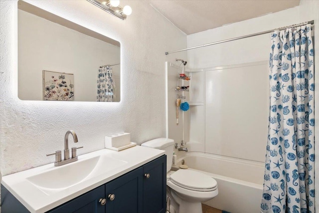 full bathroom featuring vanity, shower / bath combination with curtain, and toilet