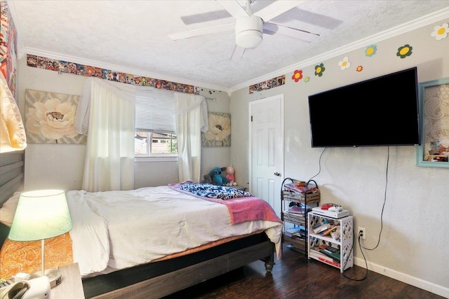 bedroom with ceiling fan, crown molding, dark wood-type flooring, and a textured ceiling