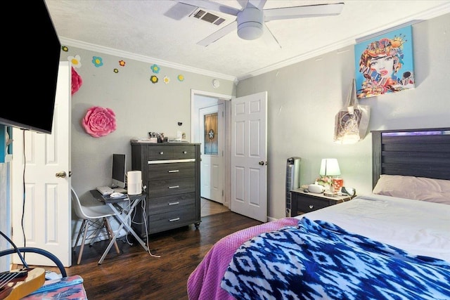 bedroom featuring dark hardwood / wood-style flooring, ceiling fan, and crown molding