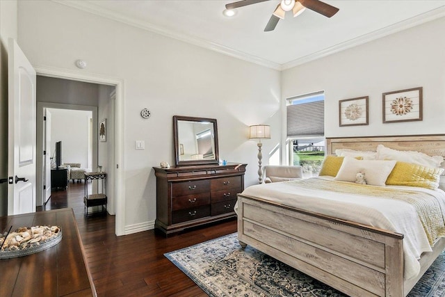 bedroom with dark hardwood / wood-style flooring, ceiling fan, and ornamental molding