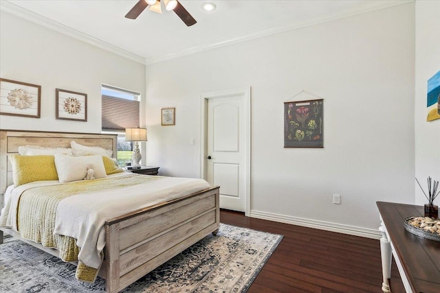 bedroom with dark hardwood / wood-style flooring, ceiling fan, and crown molding