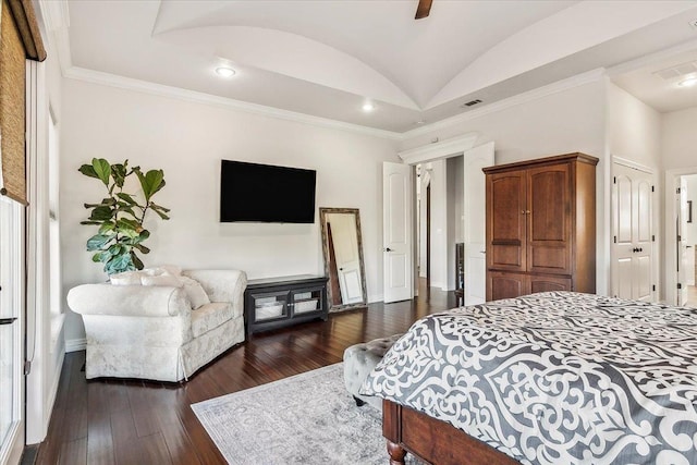 bedroom featuring ornamental molding, dark hardwood / wood-style flooring, ceiling fan, and lofted ceiling