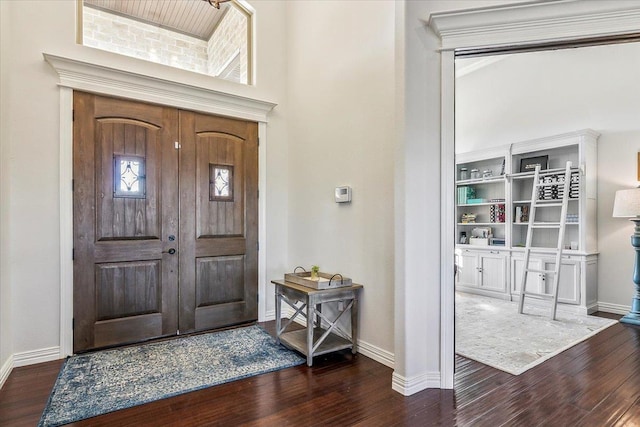 entryway featuring dark wood-type flooring