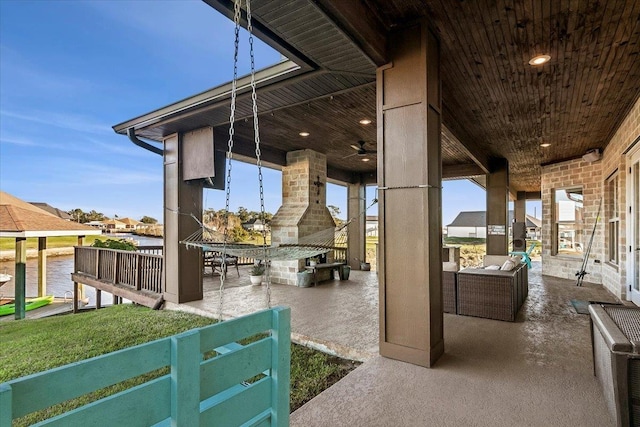 view of patio featuring ceiling fan