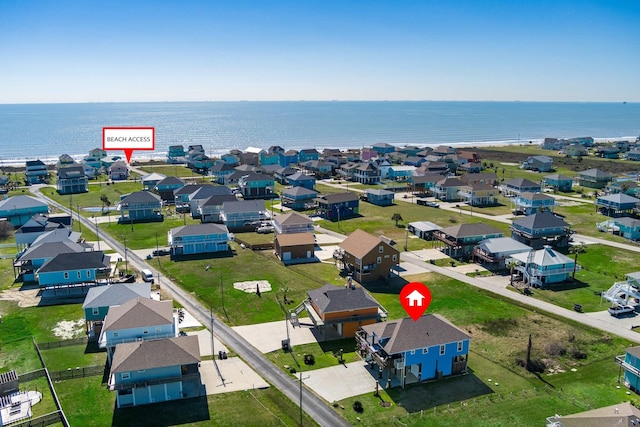 bird's eye view with a water view and a residential view