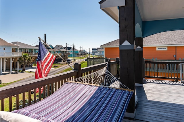 wooden deck featuring a residential view