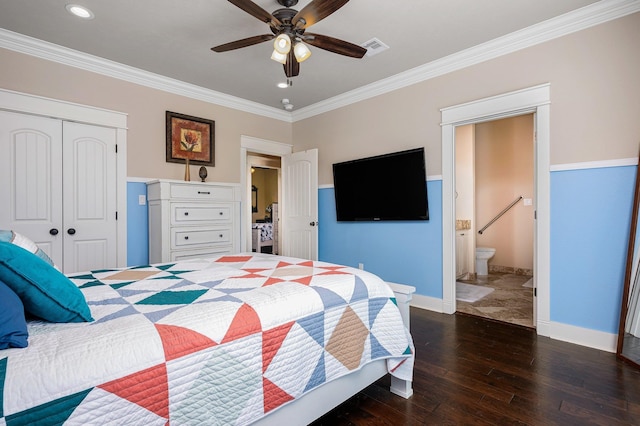 bedroom with visible vents, ornamental molding, a closet, and wood finished floors