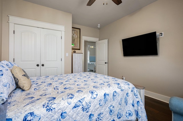 bedroom with a closet, wood finished floors, a ceiling fan, and baseboards