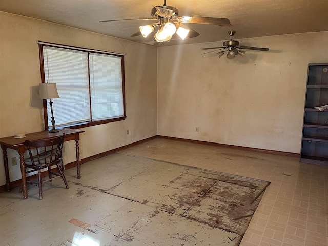 spare room featuring ceiling fan