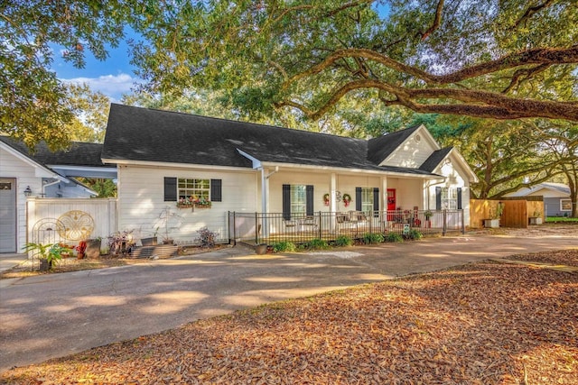 390 N Major Dr, Beaumont, TX 77706 - view of front of house featuring roof with shingles