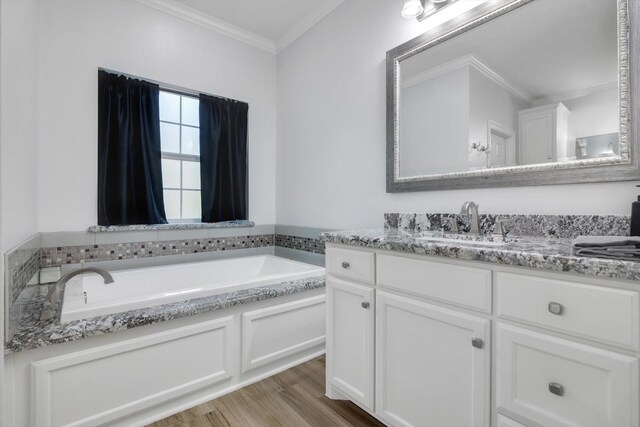 390 N Major Dr, Beaumont, TX 77706 - full bathroom featuring vanity, a bath, wood finished floors, and ornamental molding