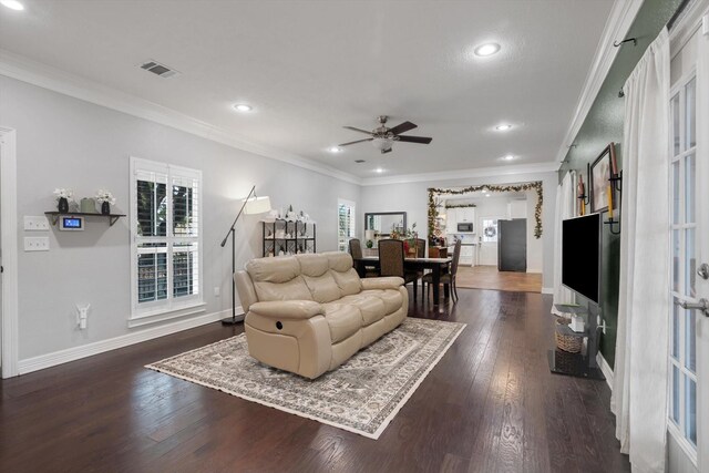 390 N Major Dr, Beaumont, TX 77706 - living area with dark wood-style floors, crown molding, recessed lighting, a ceiling fan, and baseboards