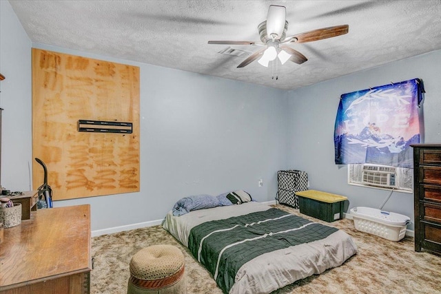 bedroom featuring carpet, a textured ceiling, and ceiling fan