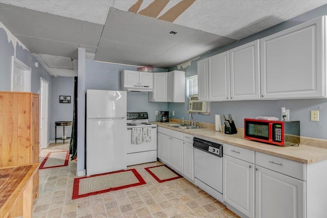 kitchen featuring white cabinetry, white appliances, and sink