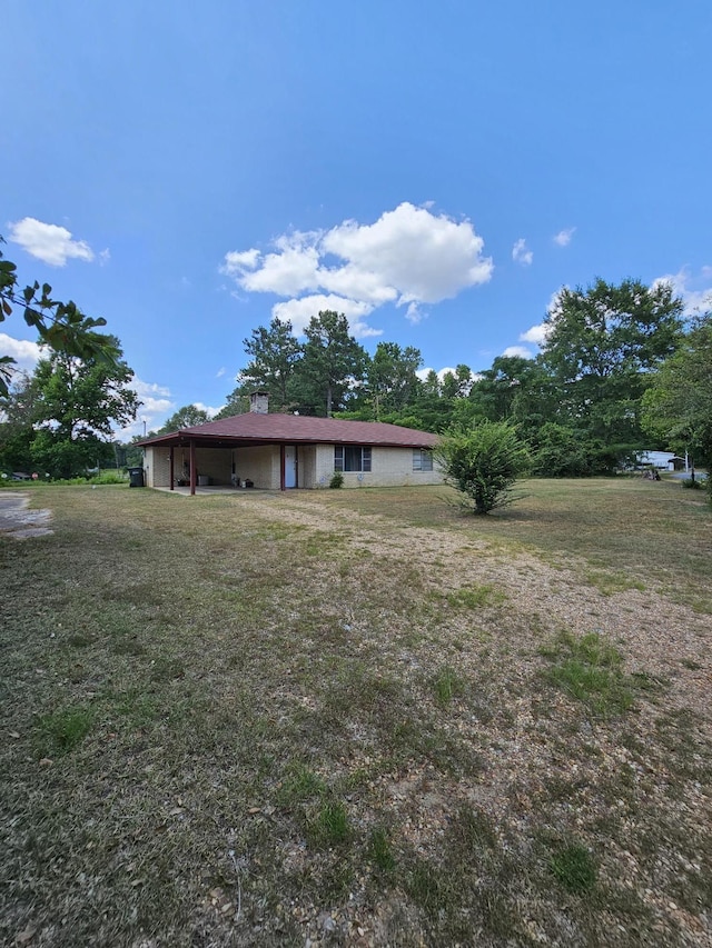 exterior space with a front lawn