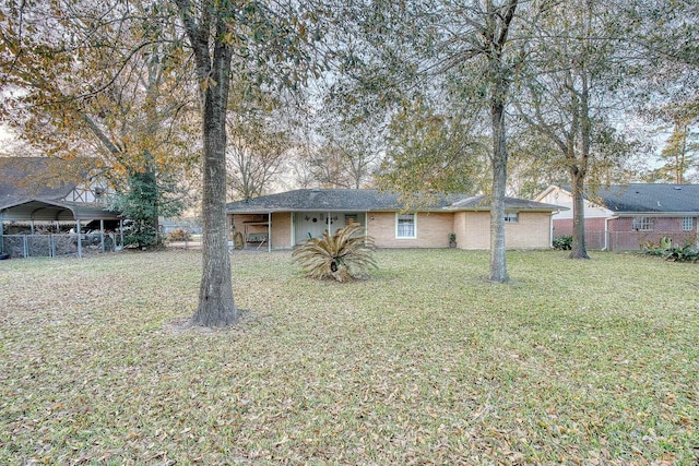 view of yard with a carport