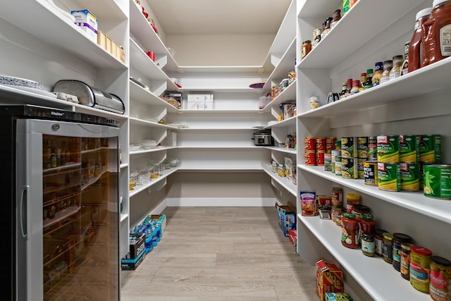 pantry with wine cooler