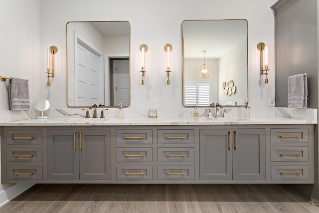 bathroom featuring vanity and hardwood / wood-style flooring