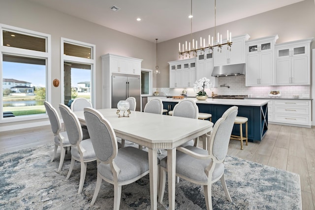 dining room with light hardwood / wood-style floors