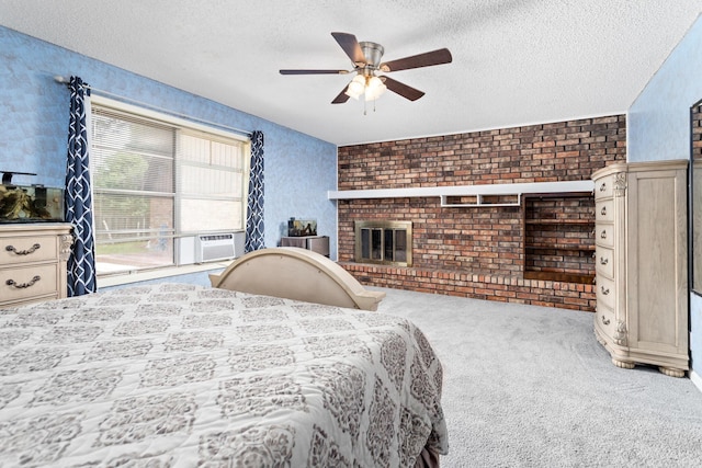 carpeted bedroom featuring ceiling fan, a fireplace, a textured ceiling, and cooling unit