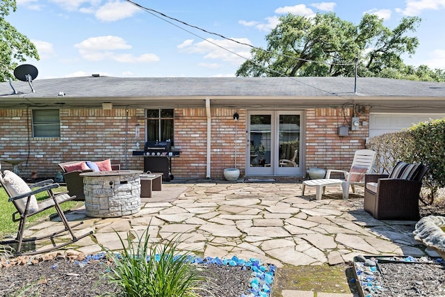 view of patio featuring a fire pit and grilling area