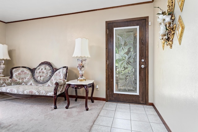 tiled entrance foyer featuring ornamental molding