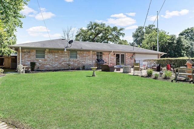 back of property featuring outdoor lounge area and a yard