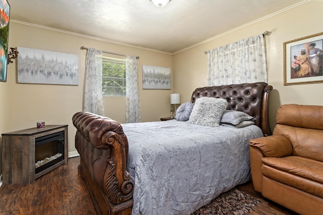 bedroom with dark hardwood / wood-style flooring and crown molding