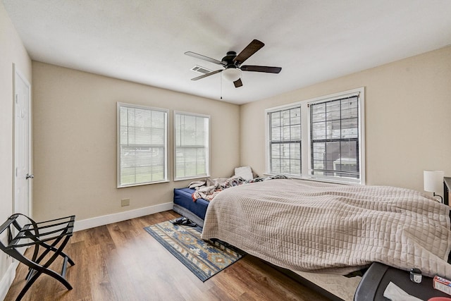 bedroom featuring ceiling fan and light wood-type flooring