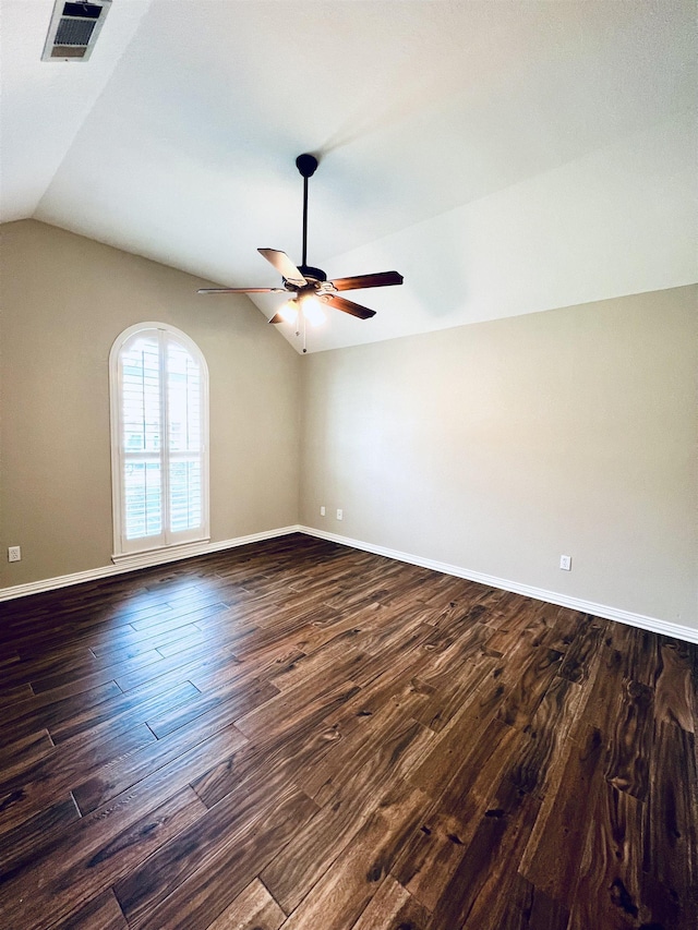 2411 Post Oak Ln, Groves, TX 77619 - empty room featuring lofted ceiling, a ceiling fan, and dark wood-style flooring