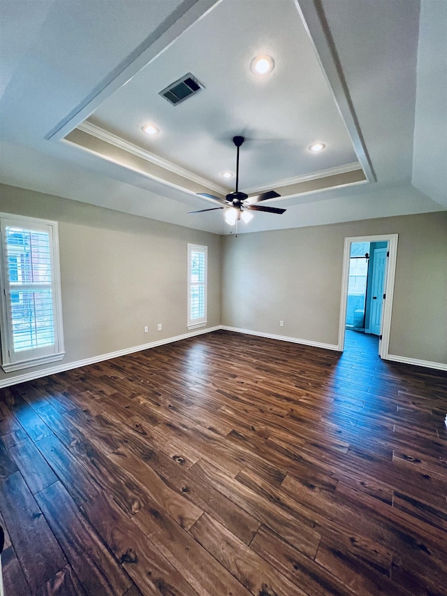 2411 Post Oak Ln, Groves, TX 77619 - spare room with a tray ceiling, ornamental molding, dark wood-type flooring, recessed lighting, and a ceiling fan