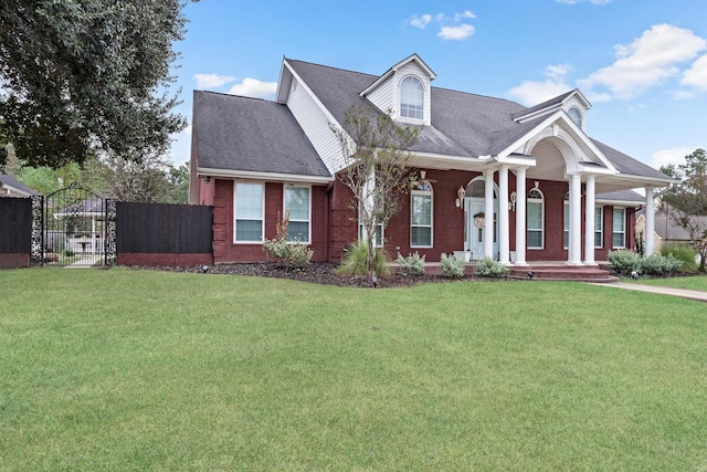 view of front of property with a front lawn