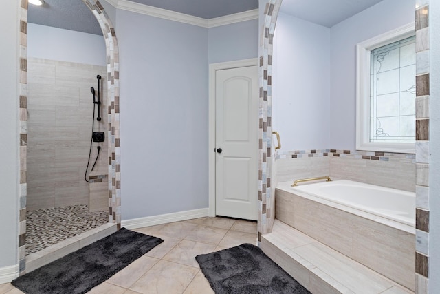 bathroom with tile patterned flooring, plus walk in shower, and crown molding