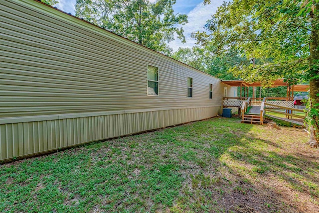 view of yard with a deck
