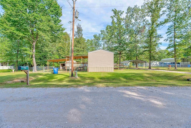 view of yard featuring a carport