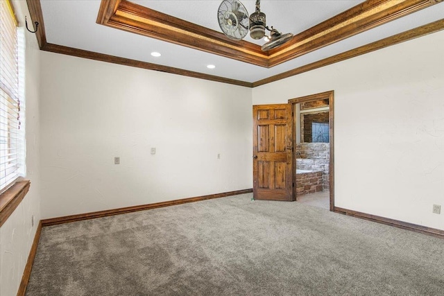 unfurnished room featuring carpet floors and crown molding