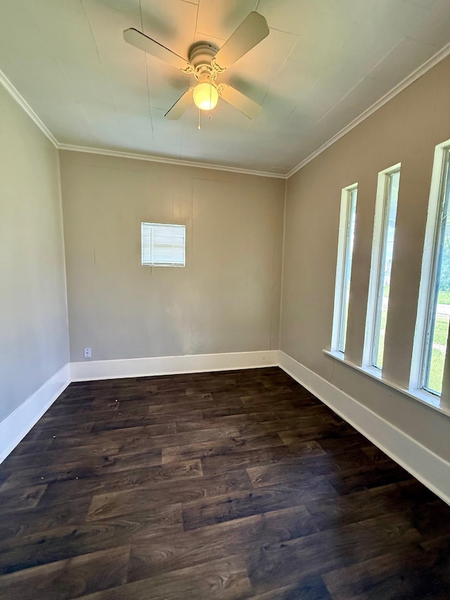 932 Dallas Ave, Port Arthur, TX 77640 - spare room featuring crown molding, dark wood-style flooring, baseboards, and a ceiling fan