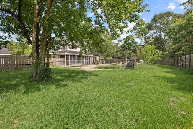 503 Country Wood Cir, Sour Lake, TX 77659 - fenced backyard featuring a sunroom