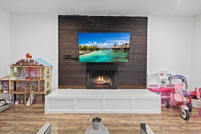 503 Country Wood Cir, Sour Lake, TX 77659 - living room with wood finished floors and a fireplace